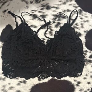 Women’s size XS/S black lace bralette with adjustable, strappy back